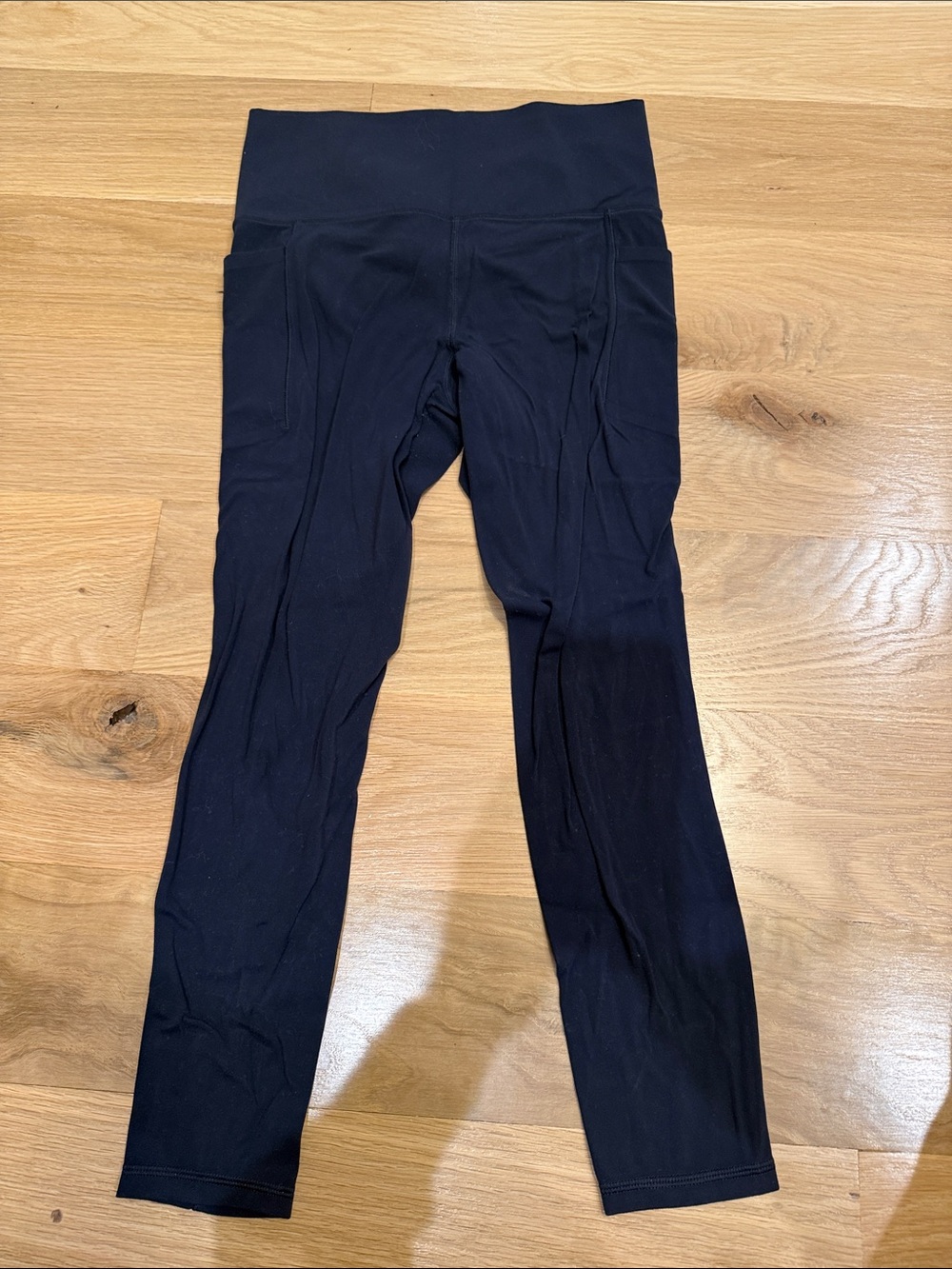 Athleta Navy Salutation Stash 7/8 Tights